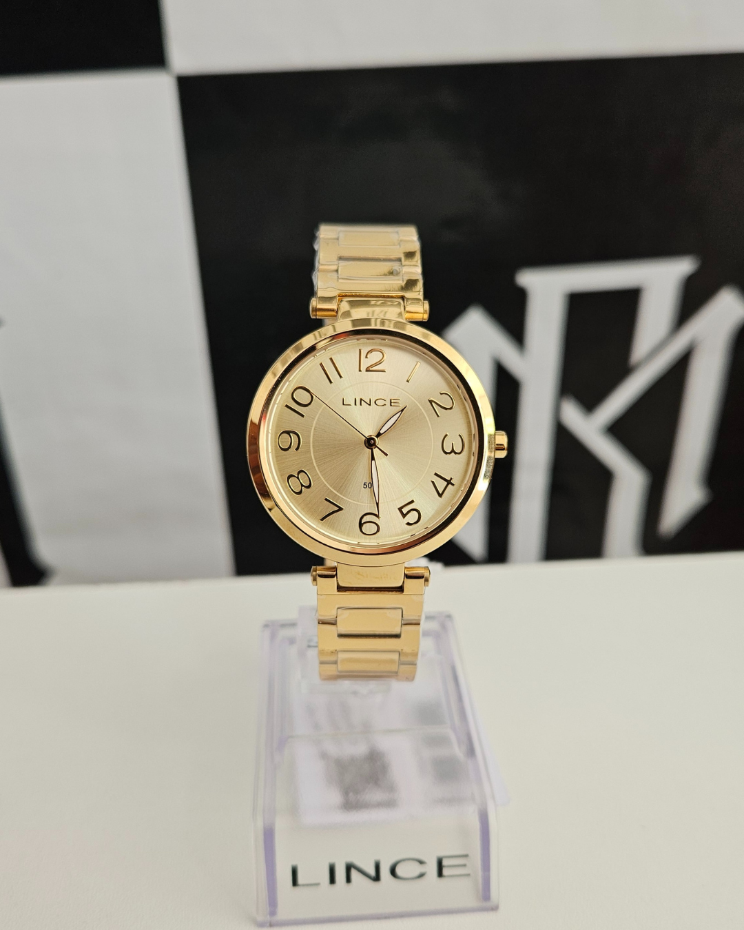 Relógio Lince Feminino Dourado Mostrador Preto Analógico