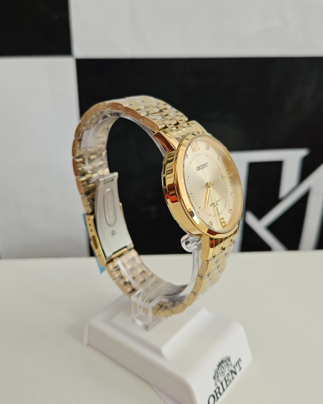 Relógio Feminino Orient Dourado com Mostrador Champanhe – 38 mm