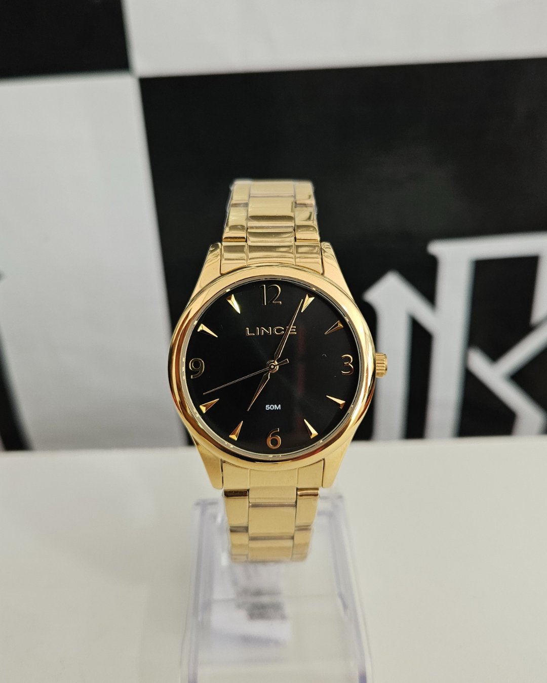 Relógio Feminino Lince Dourado com Mostrador Preto