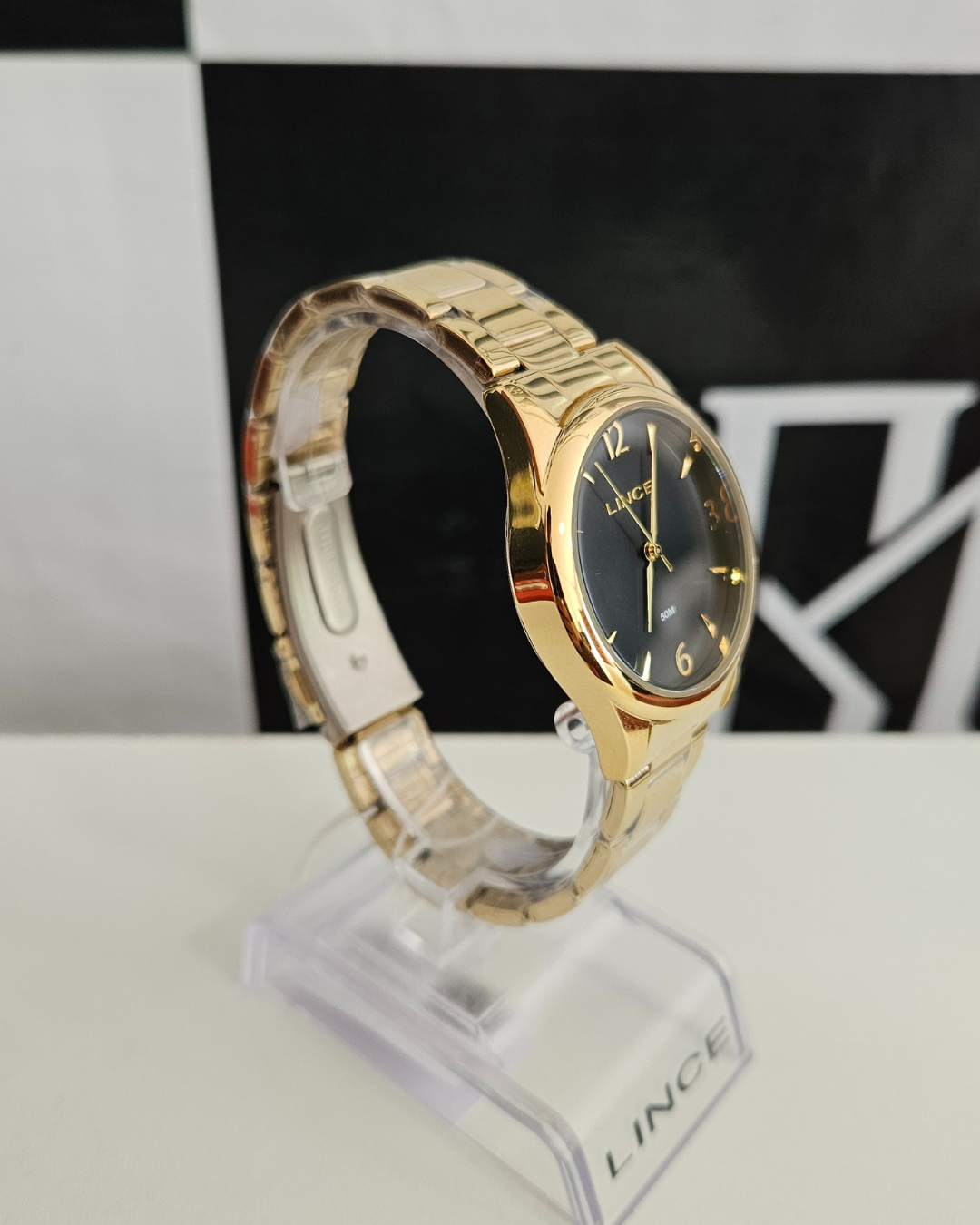 Relógio Feminino Lince Dourado com Mostrador Preto