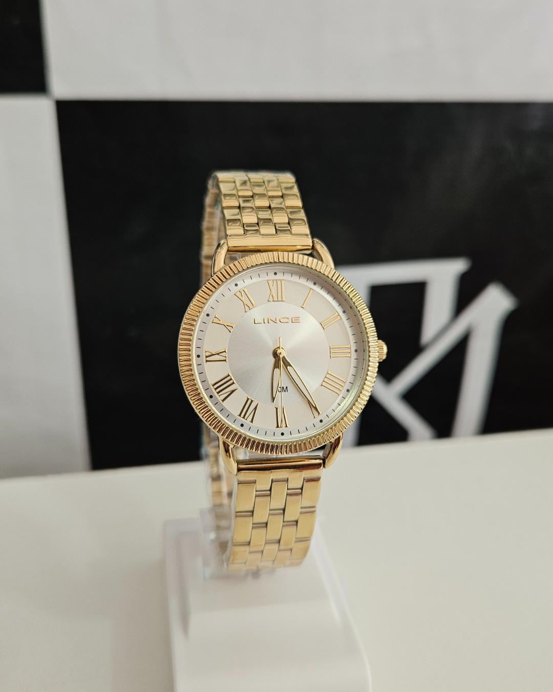 Relógio Feminino Lince Dourado com Numerais Romanos